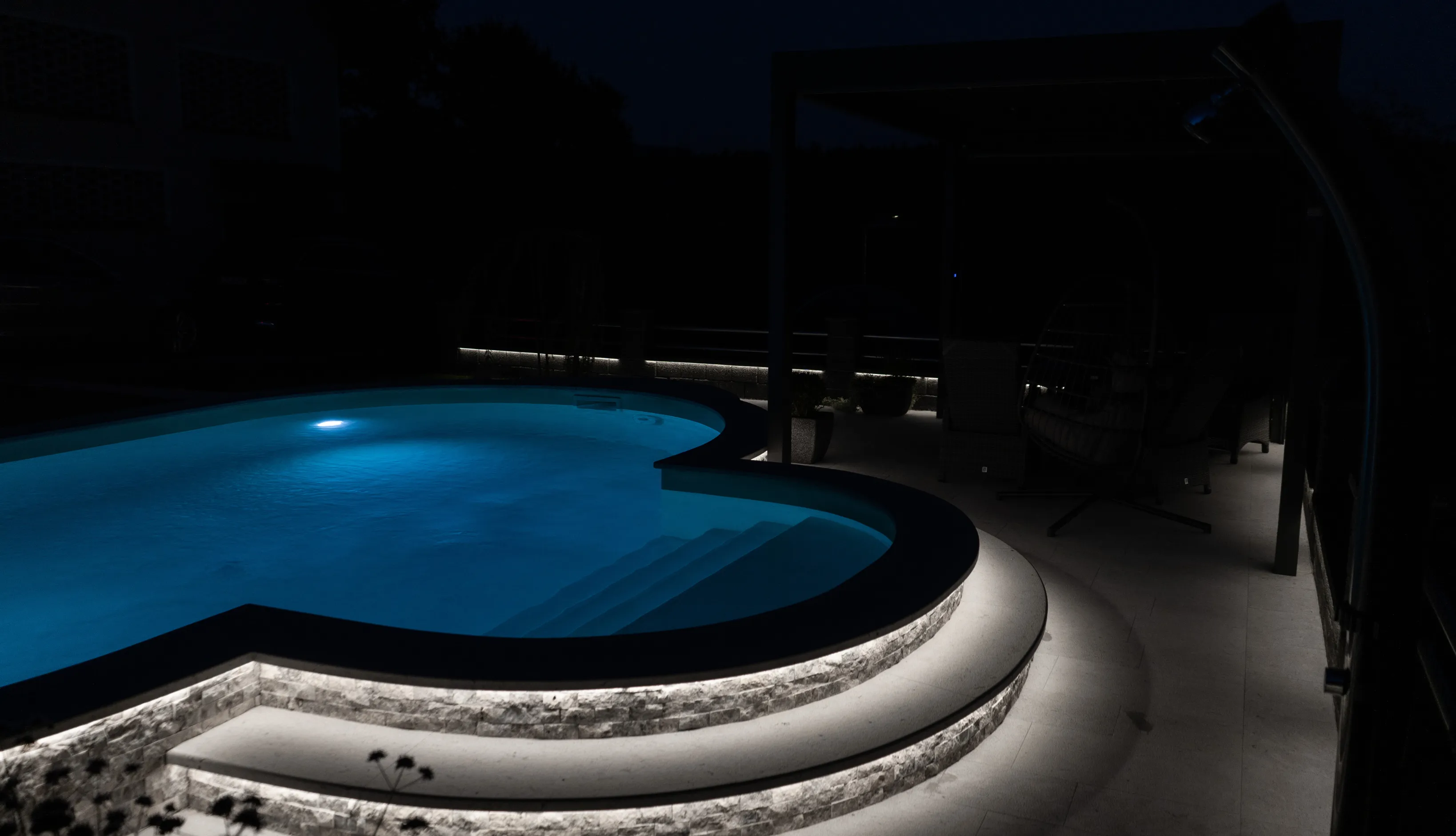 Structural gunite and block phase of a new residential pool installation following Los Angeles building safety codes.